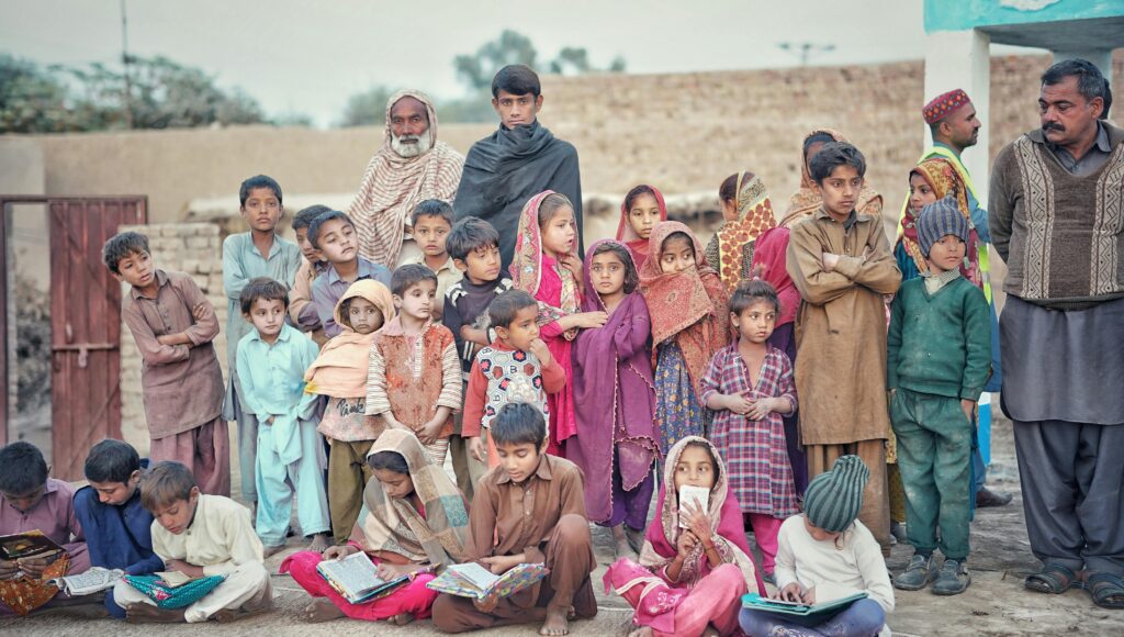 Students Studying while Sitting on the Ground